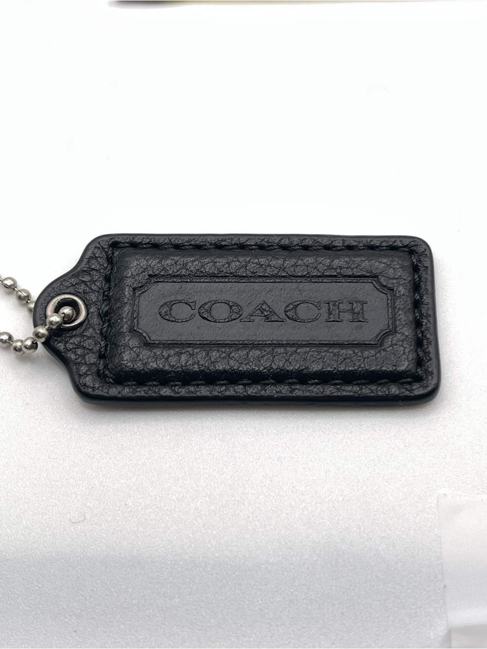 COACH Black Pebbled Leather Hang Tag